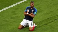 Mbape celeerates after scoring a goal in the World Cup